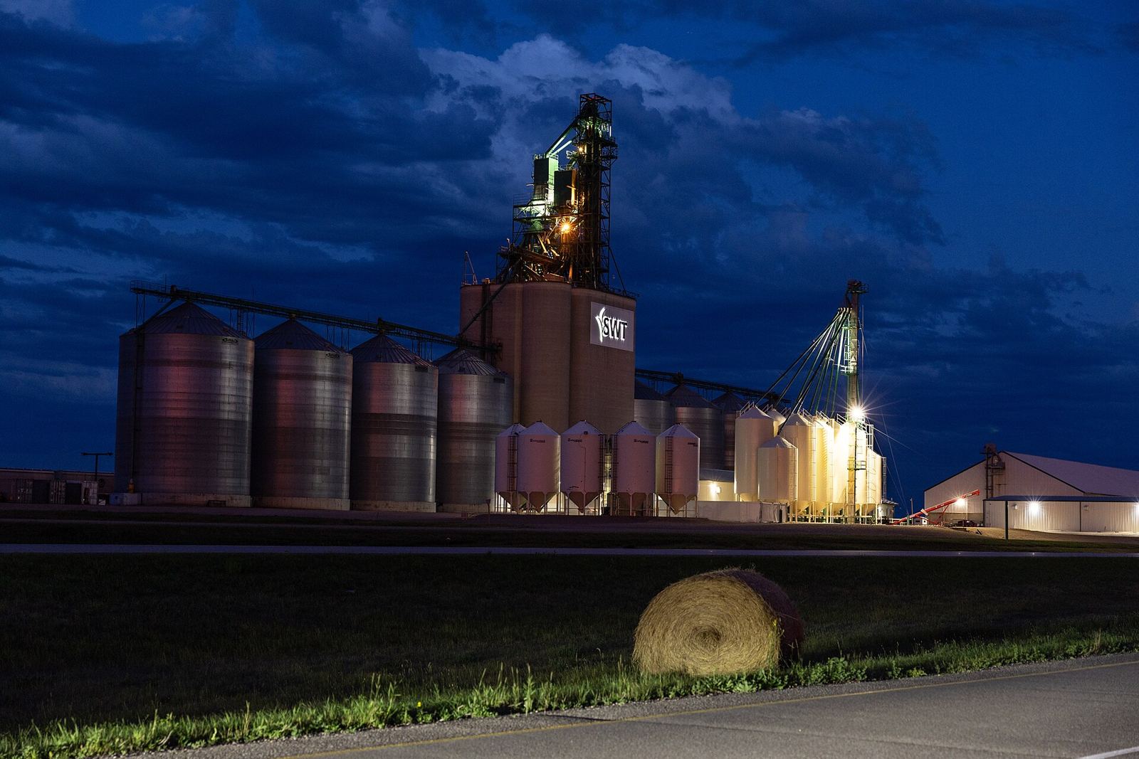 A grain elevator on the Saskatchewan prairie at dusk